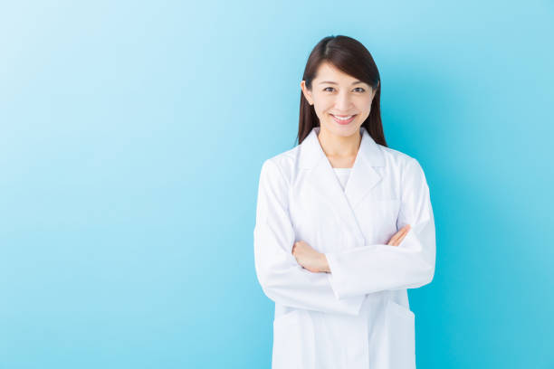 istock asian woman in a white coat 1197213736