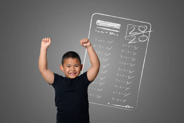 istock The boy showed full marks in some subjects tests on the blackboard. 1197220587