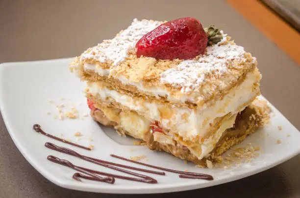 Mille-feuille or milhojas in spanish - a pastry containing layers of puff pastry, pastry cream, manjar and sugar