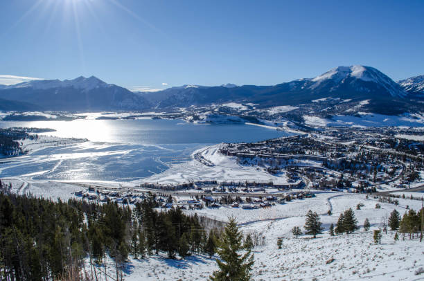 Lake Dillon in the Winter Covered in snow, Dillon offers access to a world-class winter playground with all the comfort and charm of a small mountain town. frisco colorado stock pictures, royalty-free photos & images