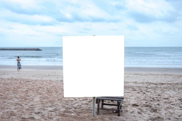istock White blank billboard ready for new advertisement at view on sea coast,Tropical beach. 1197232137