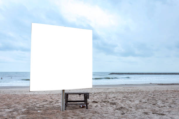 istock White blank billboard ready for new advertisement at view on sea coast,Tropical beach. 1197232383