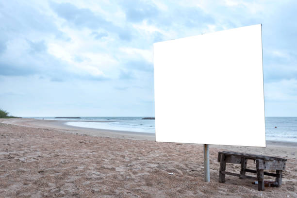 istock White blank billboard ready for new advertisement at view on sea coast,Tropical beach. 1197233065