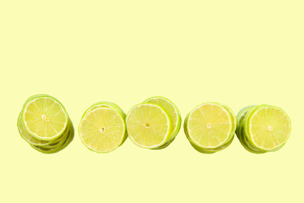 istock Lime slices isolated on white background. Space for text or design. 1197242034