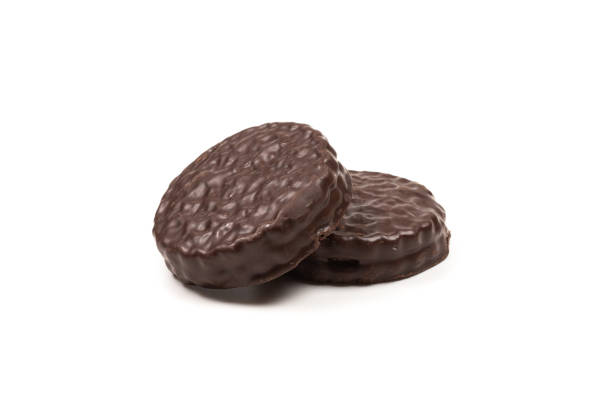 istock Chocolate cookies isolated on white. 1197242044