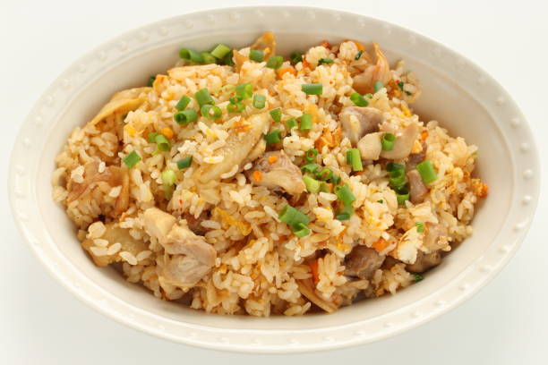istock Korean food, chicken and kimchi fried rice with spring onion 1197244981
