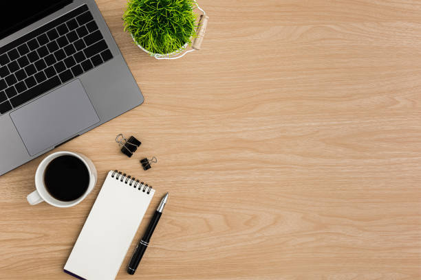 istock Top view Wood office desk table. Flat lay Workspace 1197246591