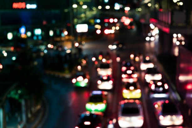 istock Defocused urban city traffic background at night with copy space 1197251432