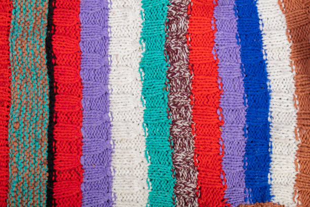 istock Knitted multi-colored texture. Background knitted product close-up. 1197256039