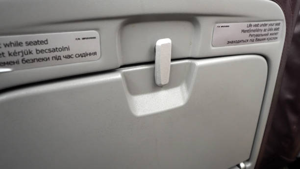 istock Woman Hand Close Airplane Tray Table 1197259609