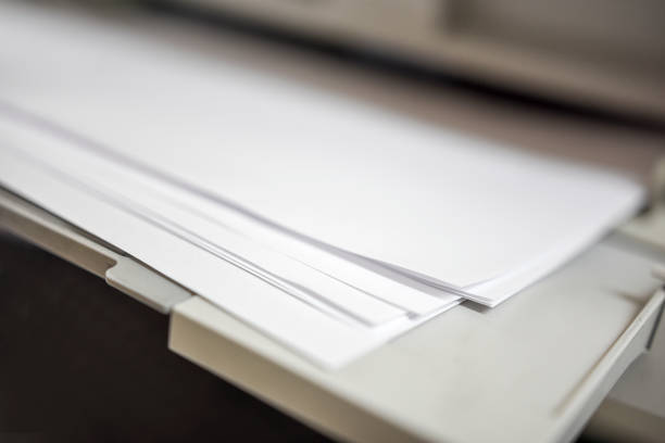 istock Print, copy and scan the business documents, focus on paper corner 1197259627