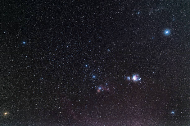 istock The Orion Nebula in the dark night sky 1197259781