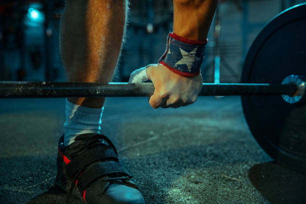 istock Caucasian man practicing in weightlifting in gym 1197262229