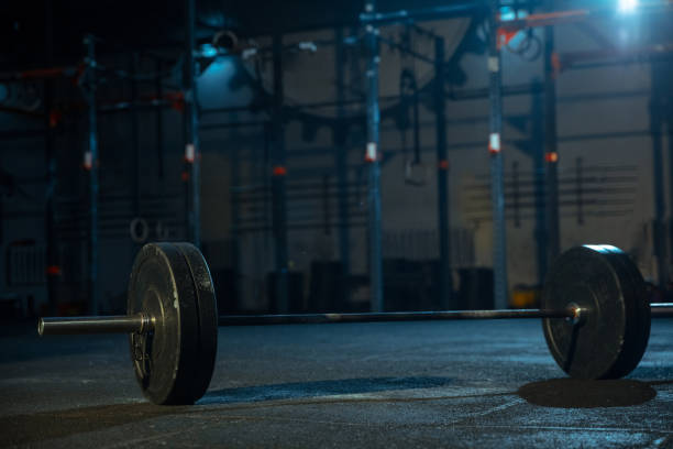 istock Barbell for weightlifting in gym 1197262779