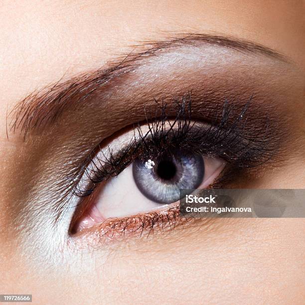 Female eye with fancy makeup Stock Photo by ©belchonock 147123369
