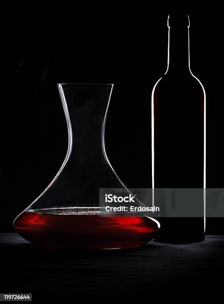 Red Wine Bottle And Decanter Silhouette Over Black Background Stock Photo - Download Image Now