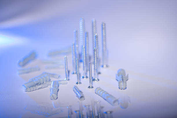 istock Screws and dowels of different sizes 1197272434