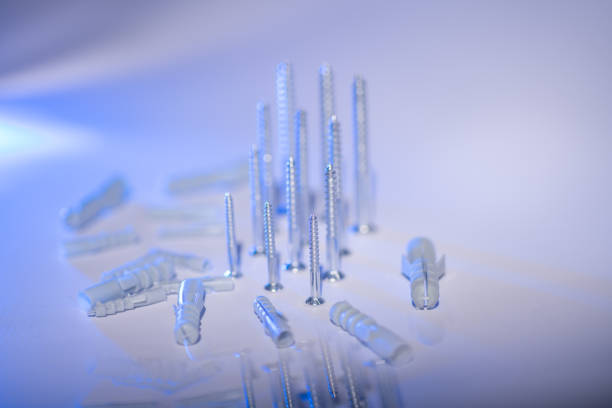 istock Screws and dowels of different sizes 1197272538