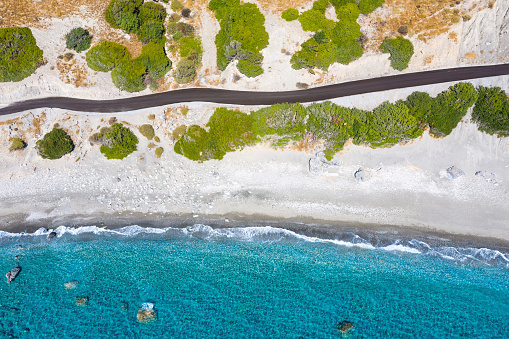 Aerial view on idyllic coastal road by the sea on south Rethymno coast (Crete, Greece).