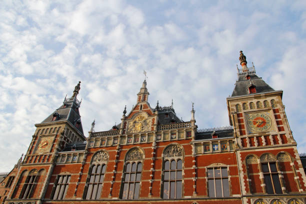 istock Amsterdam Central (Centraal) Railway Station during sunset 1197274465