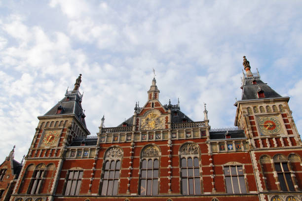 istock Amsterdam Central (Centraal) Railway Station during sunset 1197274473