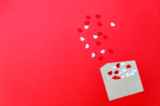 istock Envelope full of red and white hearts for a valentine's day 1197274826
