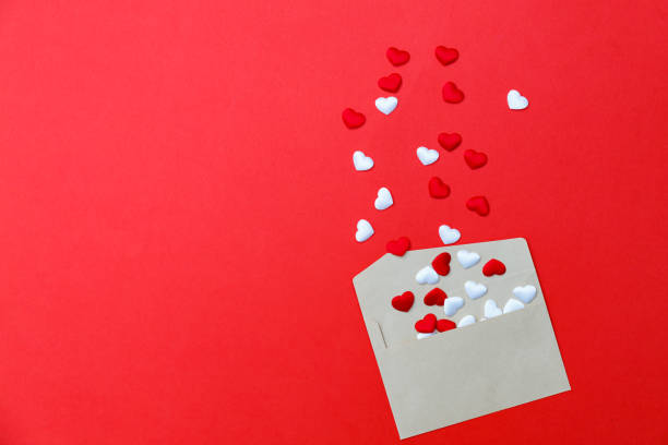istock Envelope full of red and white hearts for a valentine's day 1197274869