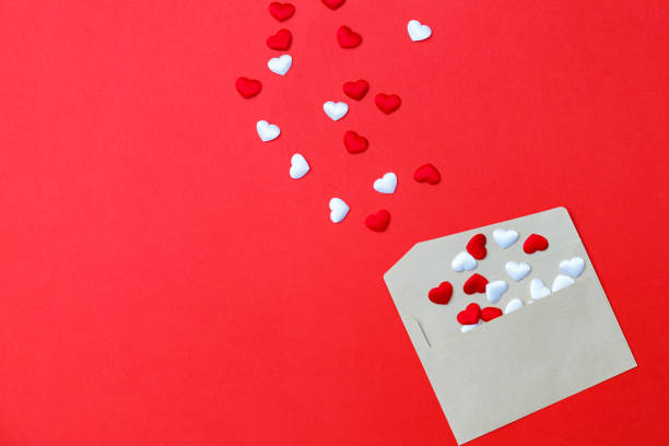 istock Envelope full of red and white hearts for a valentine's day 1197274896