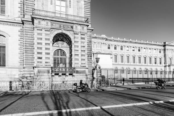 2019 The road beside the Louvre Museum buildings in Paris, France.