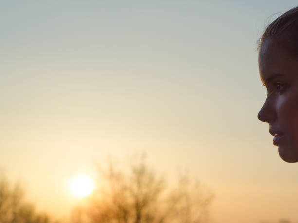 istock Young woman and the sun 1197282933