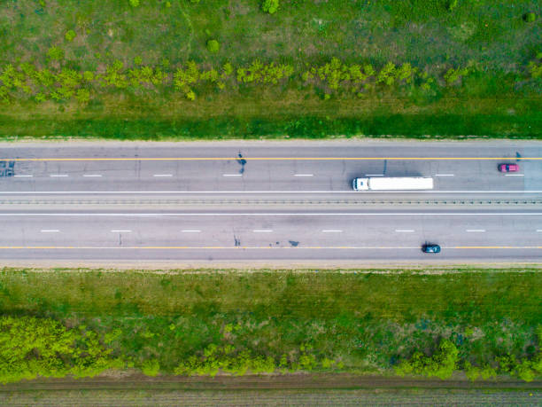 istock Highway among meadows in Russia 1197283046
