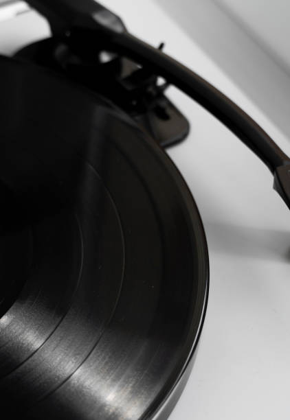 istock Vinyl turntable on a white background. Retro audio equipment for vinyl disk. 1197285042