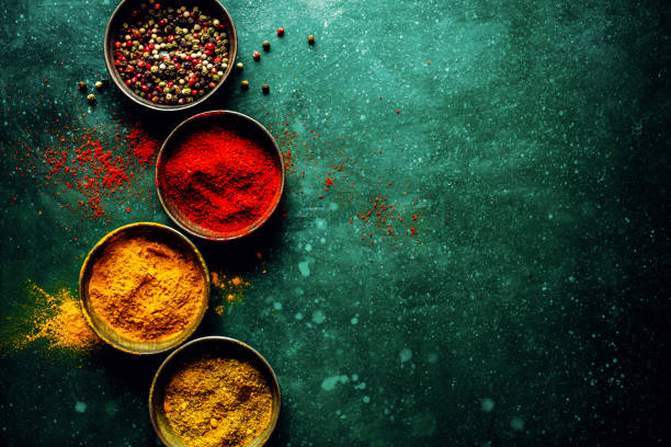 Colorful spices on dark background