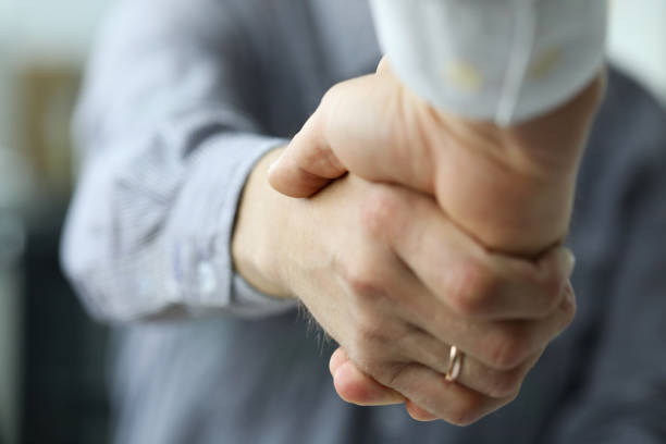 Two business people shaking hands as future prospects symbol close-up