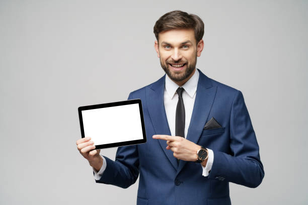istock Young Businessman presenting digital tablet pc pad with blank screen 1197289614