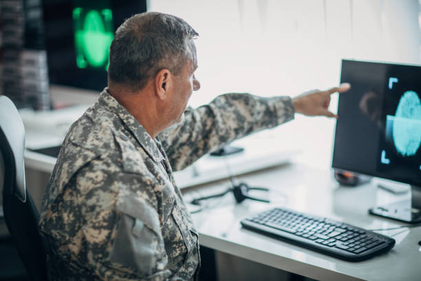 istock An old American soldier works in an office 1197290194