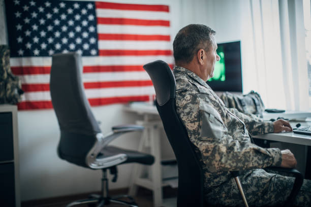 istock American soldier in office 1197290902