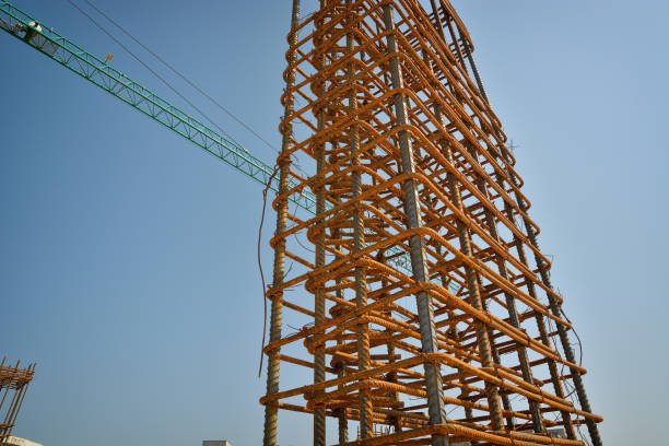 istock bundle of reinforced components and crane in a construction site 1197291058