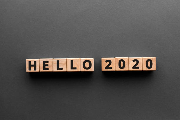 istock Hello 2020 - word from wooden blocks with letters 1197294486