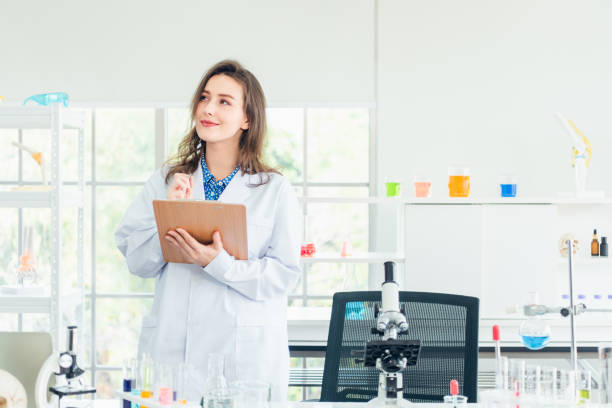 istock Young female scientist working in the laboratory 1197294951