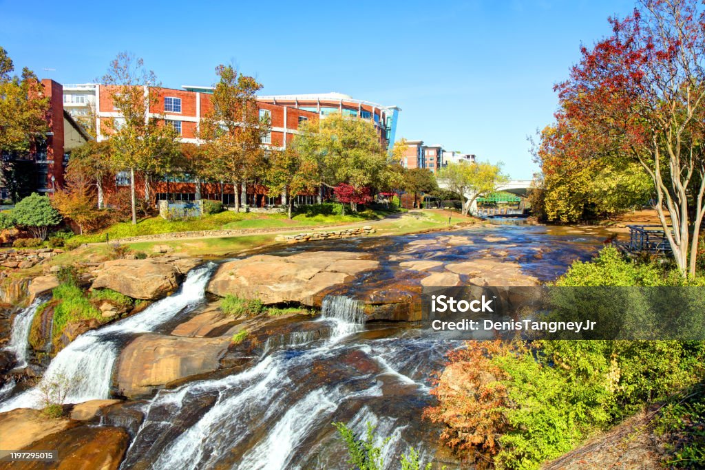 Falls Park on the Reedy in Greenville, South Carolina Falls Park on the Reedy is a 32-acre park adjacent to downtown Greenville, South Carolina in the historic West End district. Public Park Stock Photo