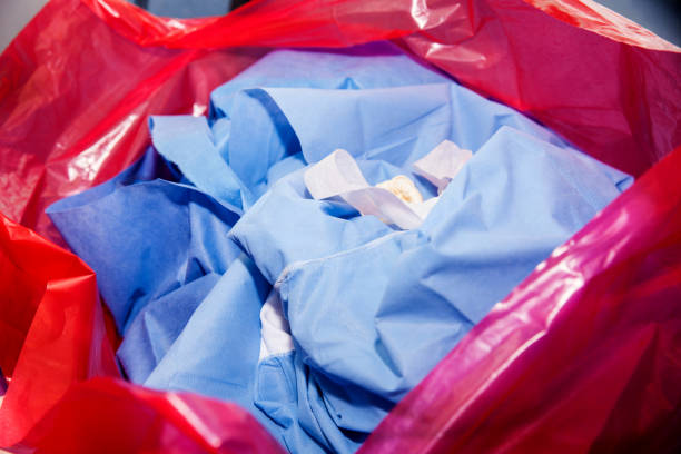 https://media.istockphoto.com/id/1197298234/photo/biological-risk-waste-disposed-of-in-the-red-trash-bag-at-a-operating-room-in-a-hospital.jpg?s=612x612&w=0&k=20&c=NQXK7HBSYL3yuPyF9EneKdM7kKhp7h7N7hGlXUl4oe4=