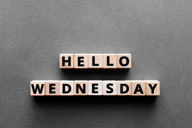 Hello wednesday - words from wooden blocks with letters stock photo