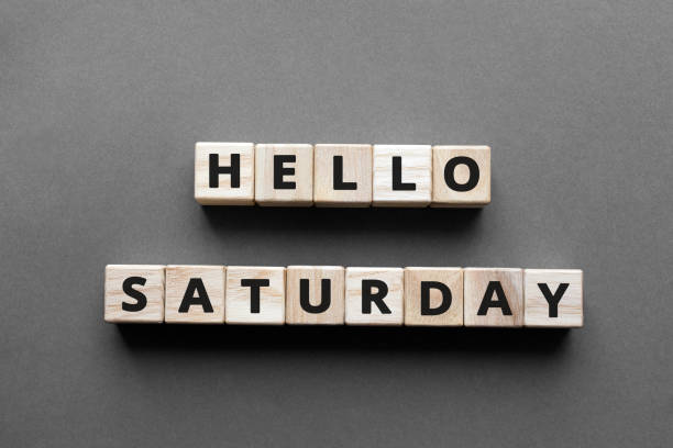 Hello saturday - words from wooden blocks with letters Hello saturday - words from wooden blocks with letters, hello saturday concept, top view gray background wednesday morning stock pictures, royalty-free photos & images