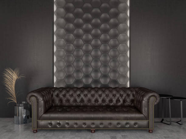 istock Black Room with Hexagonal Wall and Chesterfield Sofa 1197306776