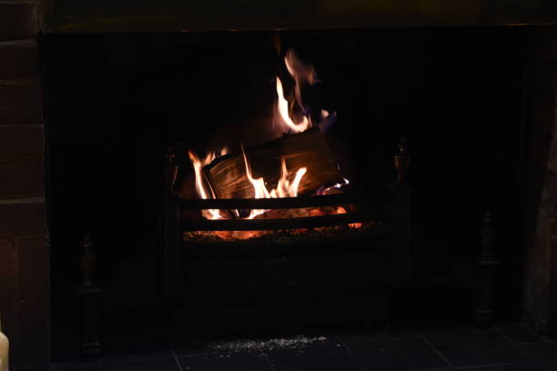istock flame of fire in the dark on black background 1197306938