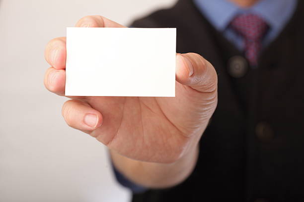 istock Blank business card in a hand 119730727