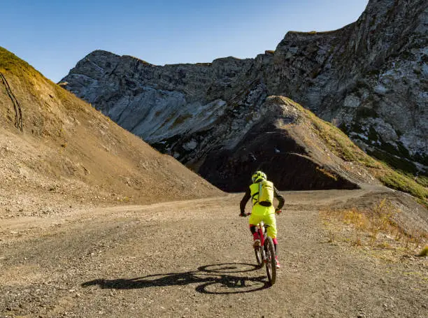 Photo of Active sport man riding mountain bike
