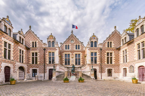 Townhall Orleans France Ancient renaissance building Hotel Groslot with statue of Jeanne D arc, in use as town hall in Orleans France orleans france photos stock pictures, royalty-free photos & images
