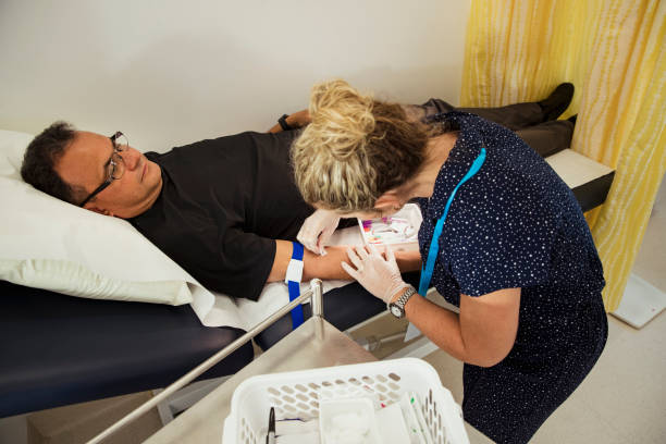 istock Nurse Taking Patient's Blood 1197311298